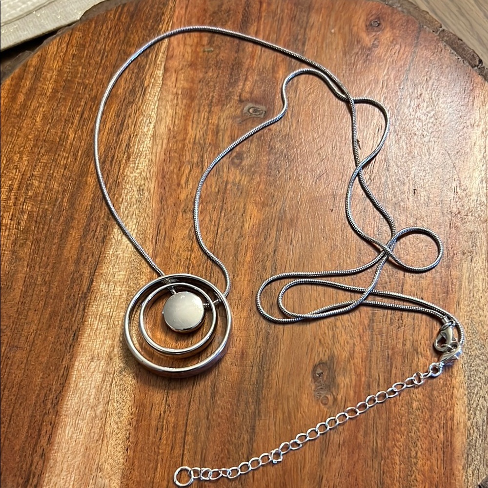 Elegant Silver Necklace with Circular Pendant